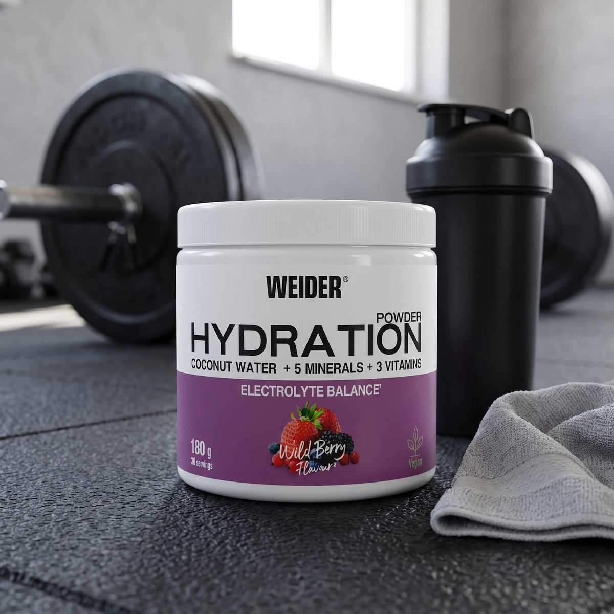 Weider Hydration Powder, on a gym floor beside a shaker