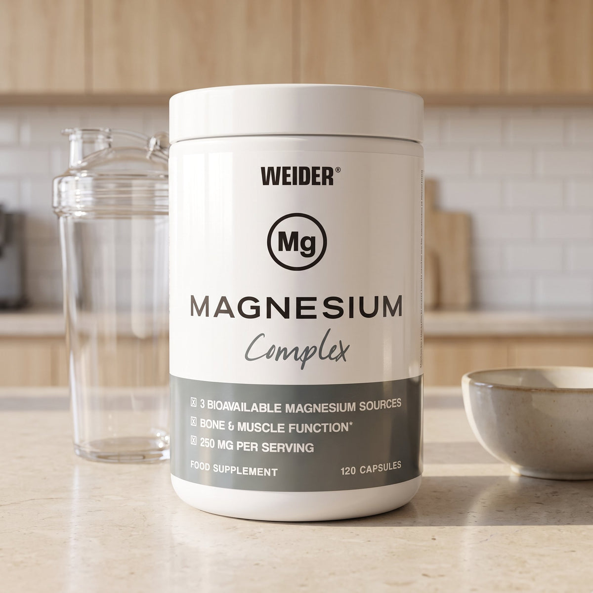 Weider Magnesium Capsules, on a kitchen counter beside a shaker