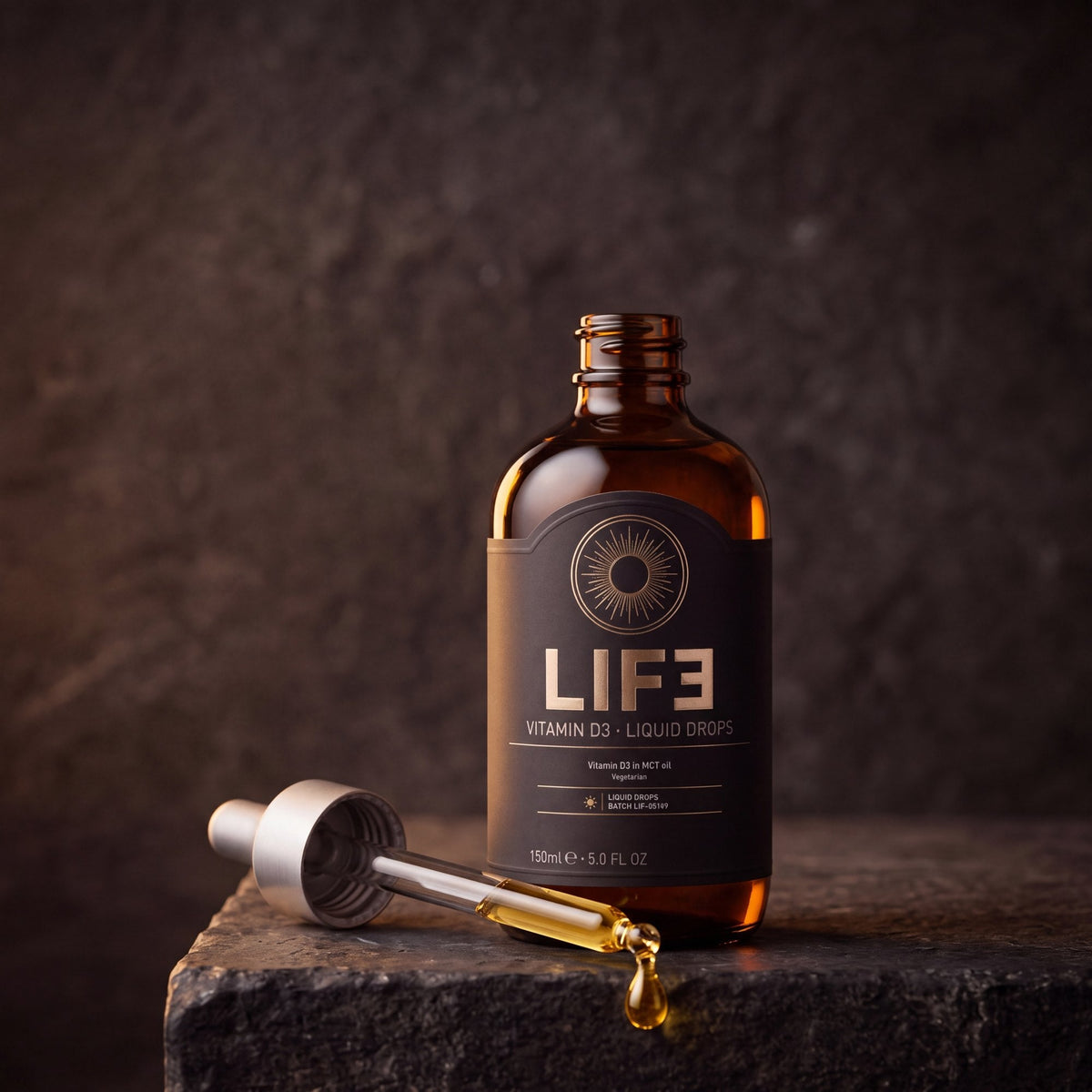 LIF3 Vitamin D3 liquid drops, 150 ml, with its glass dropper and a golden drop