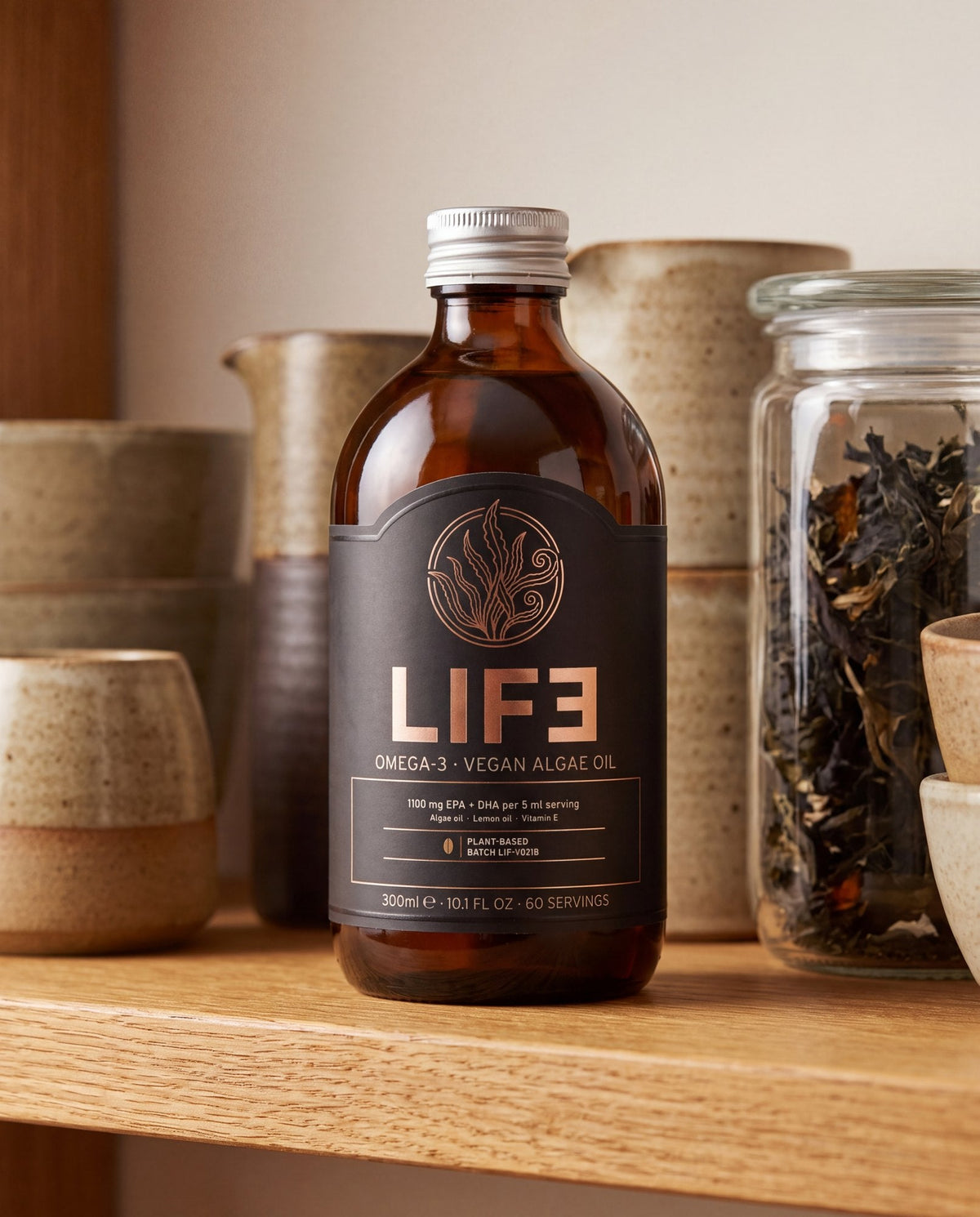 LIF3 Omega-3 vegan algae oil, 300 ml, on an oak kitchen shelf
